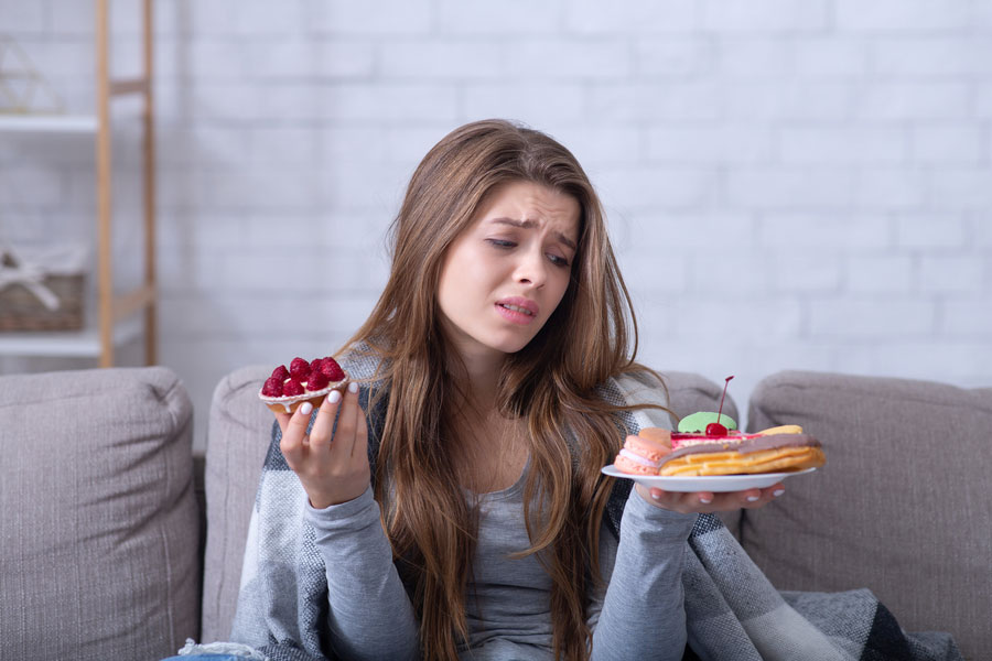 depressed-young-lady-having-eating-disorder